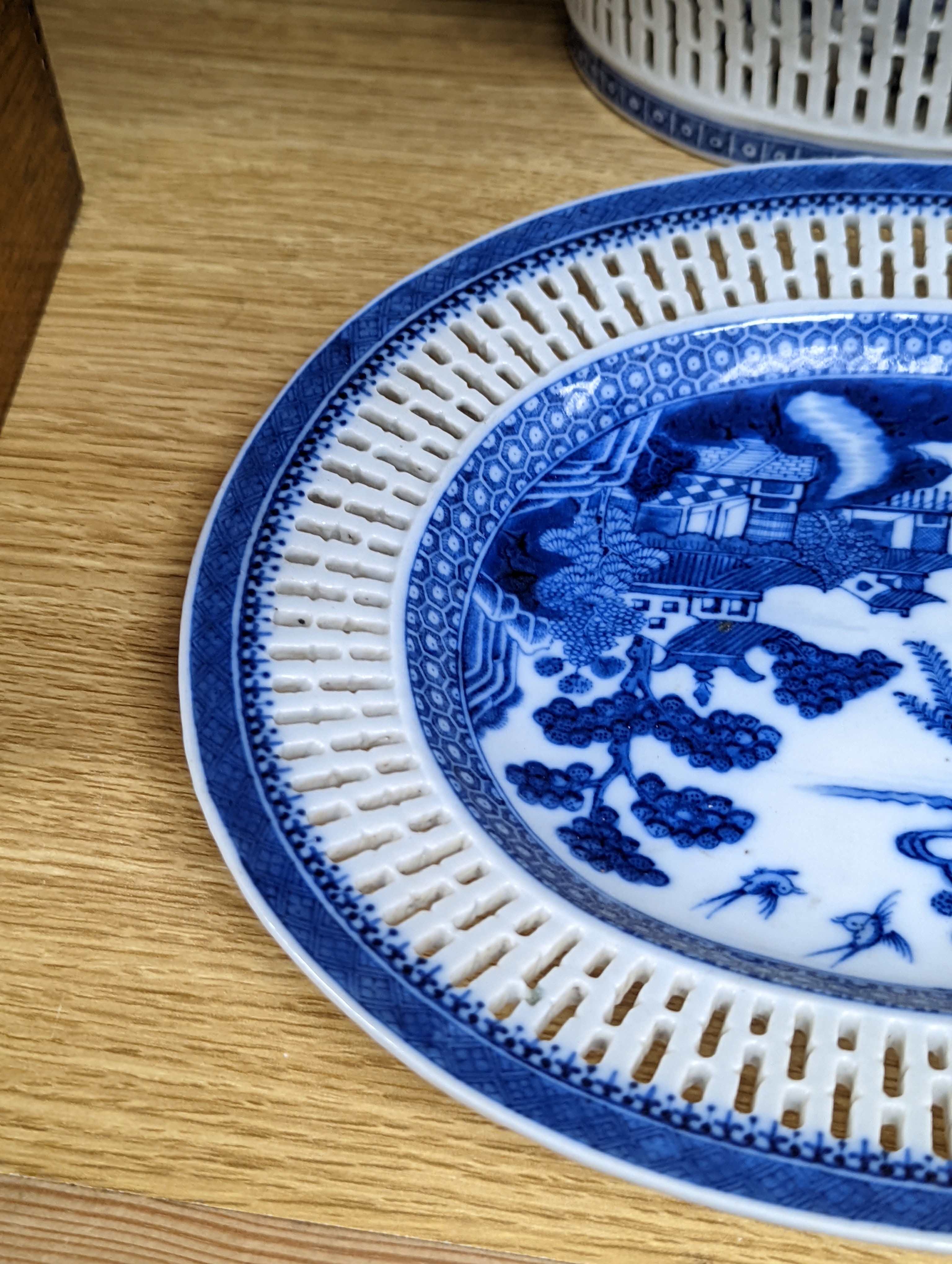 A Chinese blue and white chestnut basket and stand, Qianlong period, basket 11 cms high.